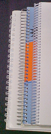 white plastic coil, white metal doubl wire, and sprial binding examples